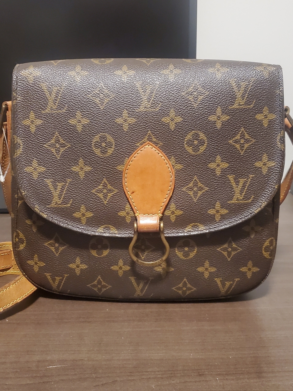 Louis Vuitton Monogram Canvas Crossbody Bag in Brown..
